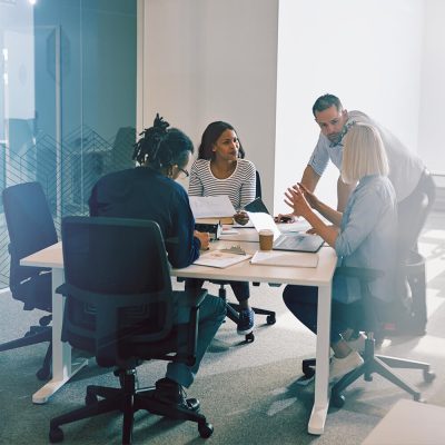 View-of-a-business-meeting-from-outside-the-glass-office